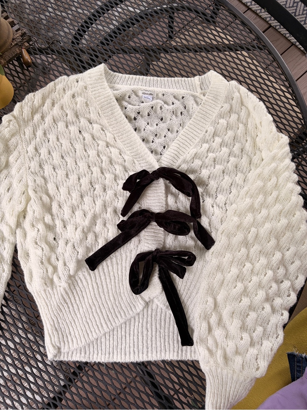 Kimchi Blue Ivory Cable-Knit V-Neck Sweater with Black Velvet Bows